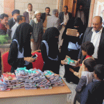 Distributing school supplies to dozens of patients